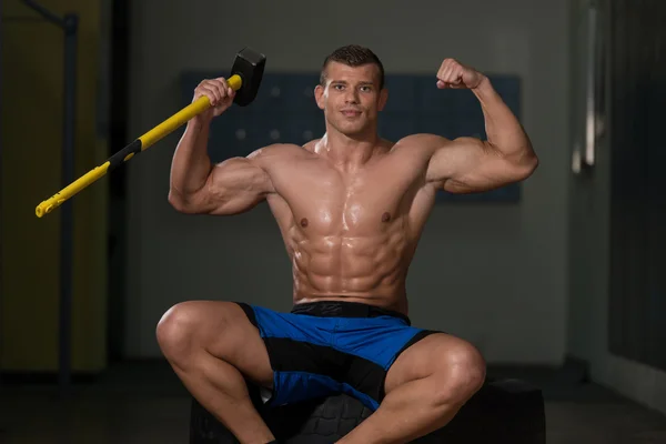 Campeón del gimnasio martillo y neumático —  Fotos de Stock