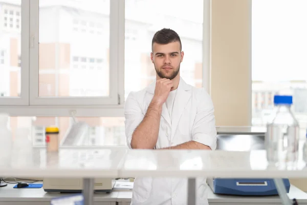 Portrait Of Cheerful Student Man Standing In Class — Stock Photo, Image