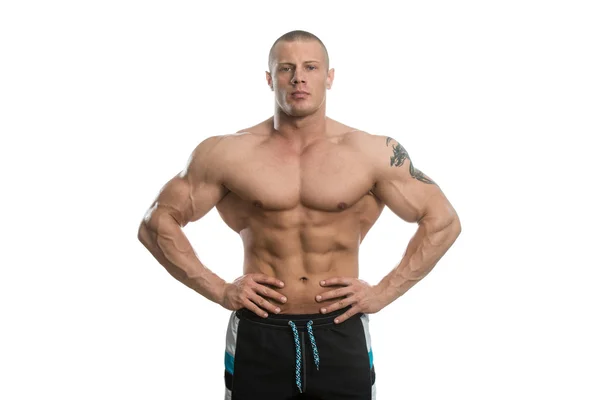 Porträtt av en Bodybuilder över vit bakgrund — Stockfoto