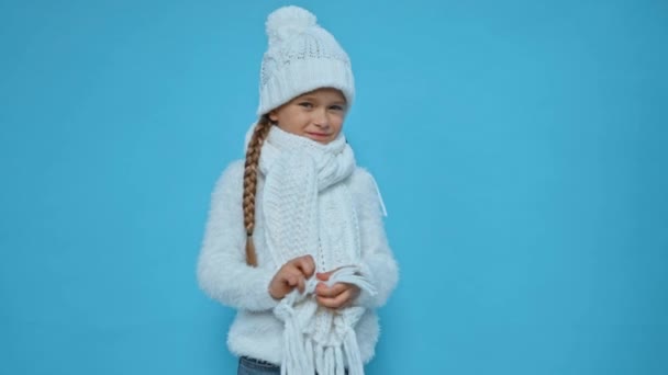 Girl Knitted White Winter Outfit Isolated Blue — Stock Video