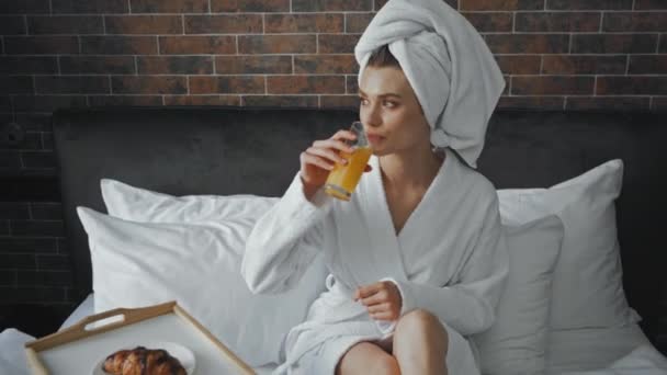 Young Woman Towel Drinking Orange Juice Tray Croissant — Stock Video