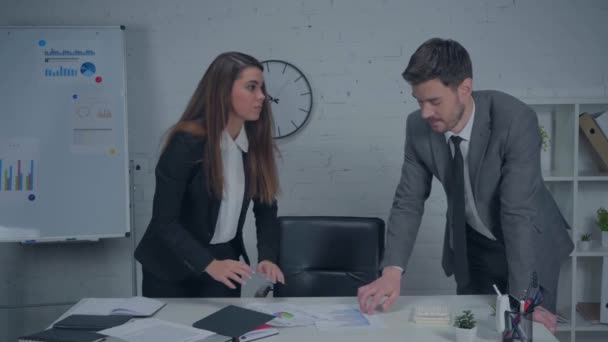 Frustrated Businesswoman Throwing Charts Desk Talking Colleague — Stock Video