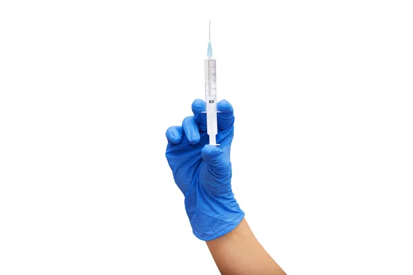 stock image Female hand in protective medical blue glove holding syringe on white background. Covid-19 and flu virus vaccination concept. Start of getting vaccine. Closeup