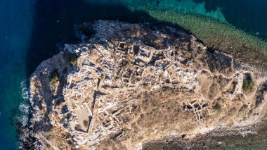 Breathtaking View of Gumusluk Bay with Yachts and Nearby Greek Islands
