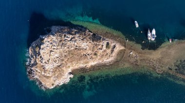 Breathtaking View of Gumusluk Bay with Yachts and Nearby Greek Islands