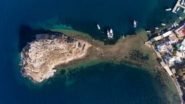 Breathtaking View of Gumusluk Bay with Yachts and Nearby Greek Islands