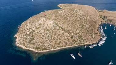 Breathtaking View of Gumusluk Bay with Yachts and Nearby Greek Islands