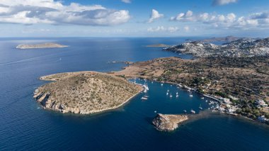 Breathtaking View of Gumusluk Bay with Yachts and Nearby Greek Islands