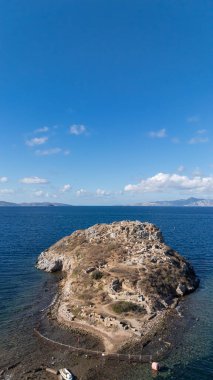 Breathtaking View of Gumusluk Bay with Yachts and Nearby Greek Islands