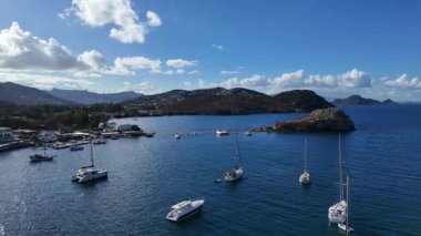 Breathtaking View of Gumusluk Bay with Yachts and Nearby Greek Islands