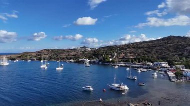 Breathtaking View of Gumusluk Bay with Yachts and Nearby Greek Islands