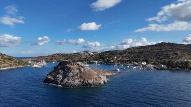 Breathtaking View of Gumusluk Bay with Yachts and Nearby Greek Islands