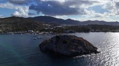Breathtaking View of Gumusluk Bay with Yachts and Nearby Greek Islands