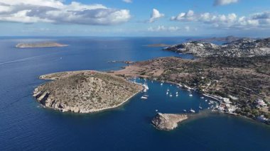 Breathtaking View of Gumusluk Bay with Yachts and Nearby Greek Islands