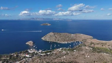 Breathtaking View of Gumusluk Bay with Yachts and Nearby Greek Islands
