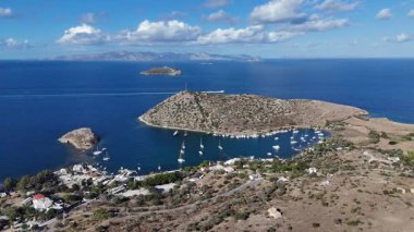 Breathtaking View of Gumusluk Bay with Yachts and Nearby Greek Islands