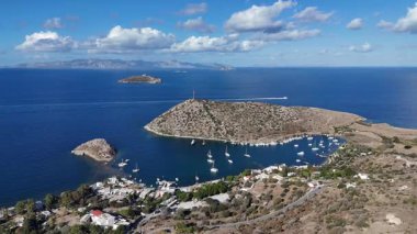Breathtaking View of Gumusluk Bay with Yachts and Nearby Greek Islands