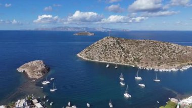 Breathtaking View of Gumusluk Bay with Yachts and Nearby Greek Islands
