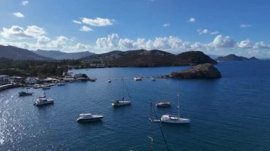 Breathtaking View of Gumusluk Bay with Yachts and Nearby Greek Islands