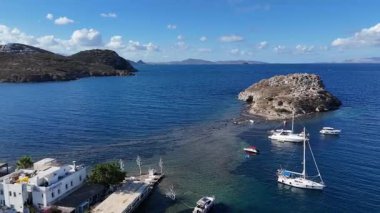 Breathtaking View of Gumusluk Bay with Yachts and Nearby Greek Islands