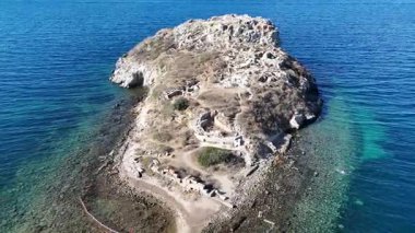 Breathtaking View of Gumusluk Bay with Yachts and Nearby Greek Islands