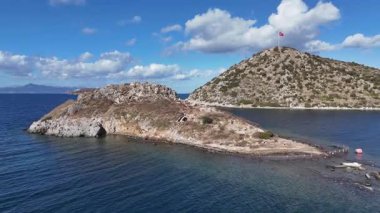 Breathtaking View of Gumusluk Bay with Yachts and Nearby Greek Islands