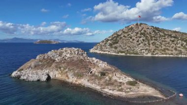 Breathtaking View of Gumusluk Bay with Yachts and Nearby Greek Islands