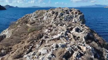 Breathtaking View of Gumusluk Bay with Yachts and Nearby Greek Islands