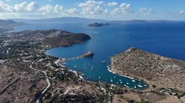 Breathtaking View of Gumusluk Bay with Yachts and Nearby Greek Islands