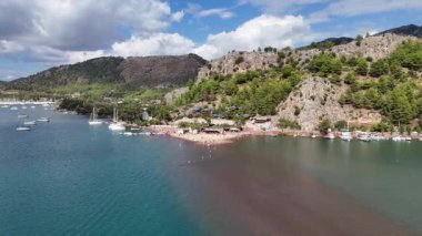 Aerial View of Kizkumu Beach and Sailboats in Marmaris, Turkey