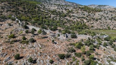 Ancient Ruins of Pyandai on Hillside Landscape