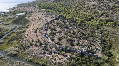 Ancient Ruins of Pyandai on Hillside Landscape