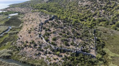 Ancient Ruins of Pyandai on Hillside Landscape