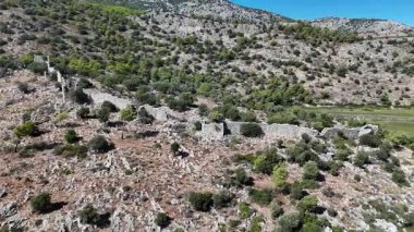 Ancient Ruins of Pyandai on Hillside Landscape