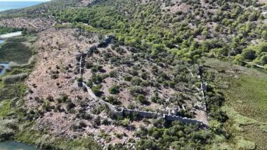 Ancient Ruins of Pyandai on Hillside Landscape