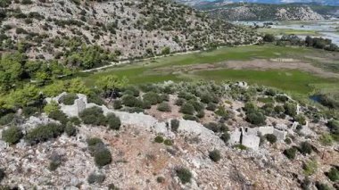 Ancient Ruins of Pyandai on Hillside Landscape
