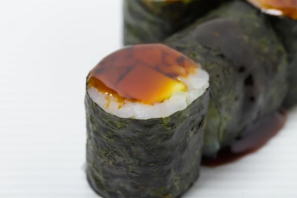 Traditional japanese avocado sushi rolls — Stock Photo, Image