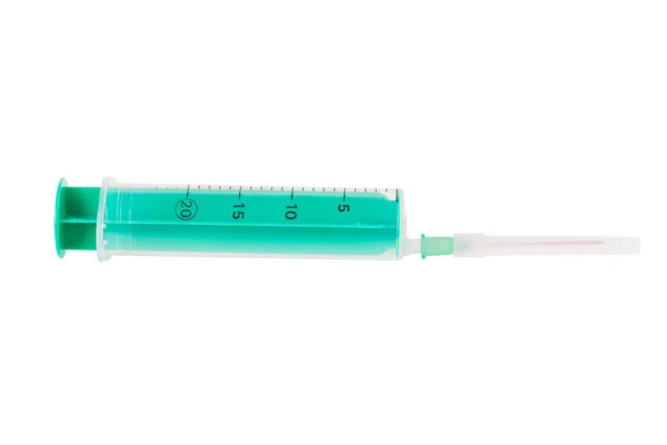 緑色のプラスチック製注射器 — ストック写真