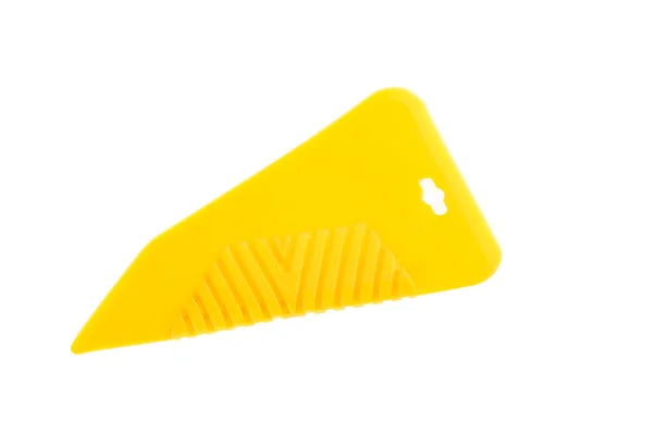 Yellow rubber industrial spatula — Stock Photo, Image