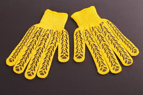Yellow protective gloves — Stock Photo, Image