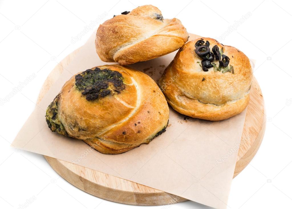 Delicious buns with spinach and olives.