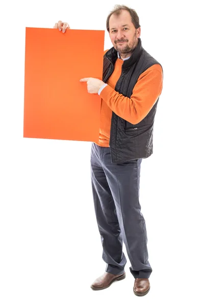 Muž, který držel list oranžový lepenky. — Stock fotografie