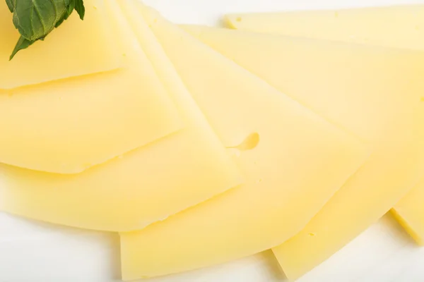 Closeup of sliced gouda cheese. — Stock Photo, Image