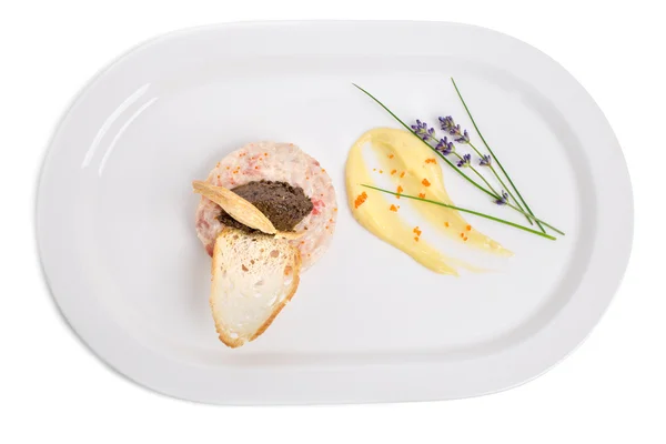 Salmon tartare with black truffle sauce. — Stock Photo, Image