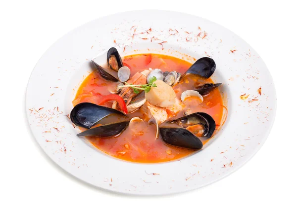 Spicy tomato seafood soup with saffron. — Stock Photo, Image