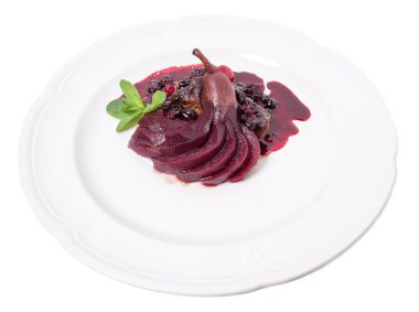 Haşlanmış armut ile ızgara kaz ciğeri.