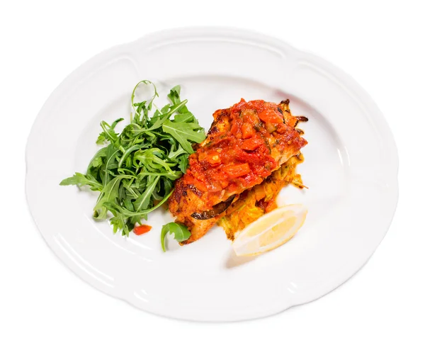 Grilled dorado covered with baked vegetables. — Stock Photo, Image