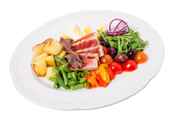 Delicious nicoise salad with baked potatoes. — Stock Photo, Image