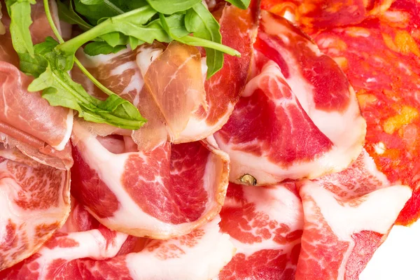 Delicious italian dried meat with arugula. — Stock Photo, Image