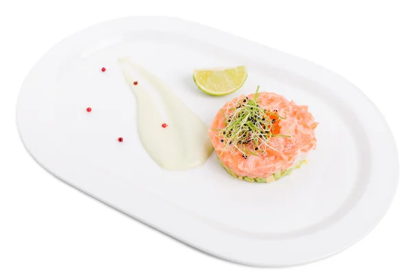 Salmon tartare with avocado and red caviar. — Stock Photo, Image